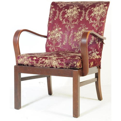 647 - Parker Knoll - A mid 20th century lounge easy armchair. Model number 714, with purple upholstered cu... 