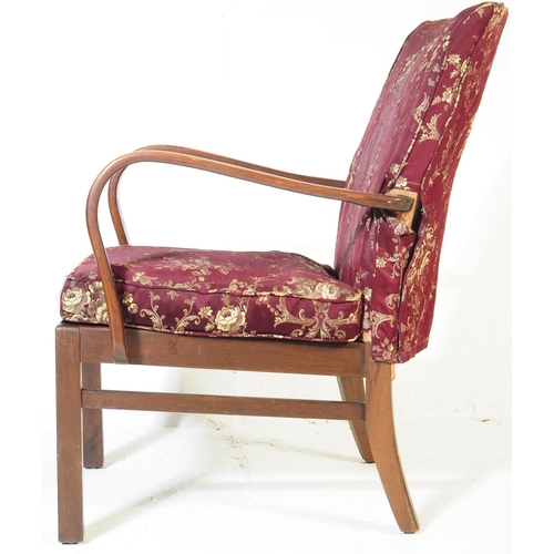 647 - Parker Knoll - A mid 20th century lounge easy armchair. Model number 714, with purple upholstered cu... 