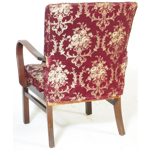 647 - Parker Knoll - A mid 20th century lounge easy armchair. Model number 714, with purple upholstered cu... 