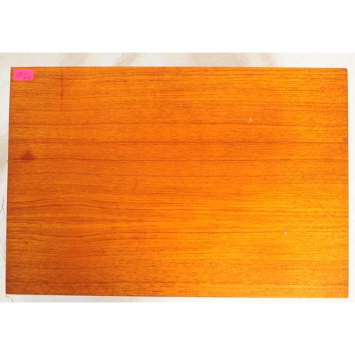 650 - Herbert Gibbs - A vintage mid 20th century teak coffee table. Rectangular form with flared top above... 