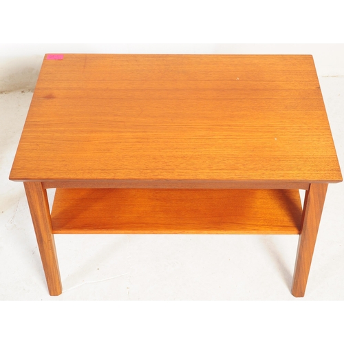 650 - Herbert Gibbs - A vintage mid 20th century teak coffee table. Rectangular form with flared top above... 