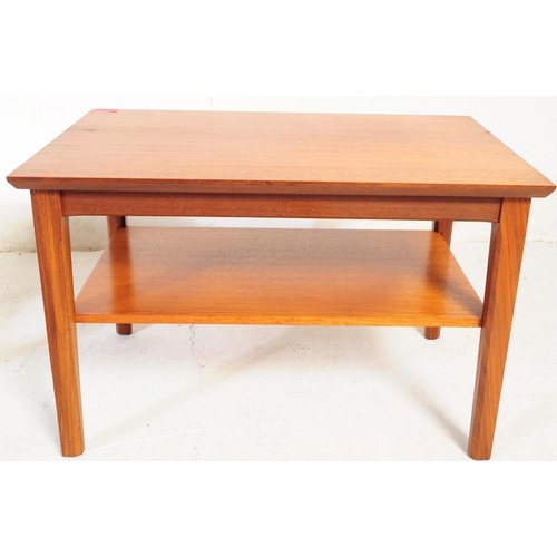 650 - Herbert Gibbs - A vintage mid 20th century teak coffee table. Rectangular form with flared top above... 