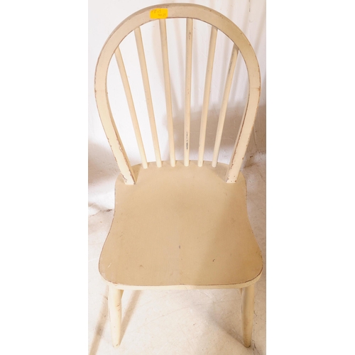 657 - A vintage 20th century kitchen / dining table. With a blue rectangular top with painted frame with t... 