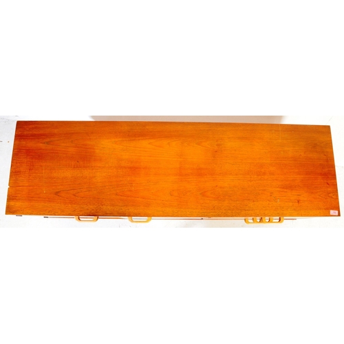 659 - British Modern Design - A mid 20th century teak wood sideboard credenza. Of rectangular form  compri... 