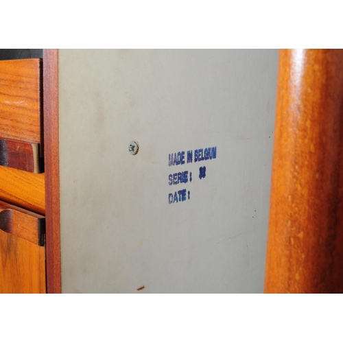 632 - A 20th century Belgium fruit wood wall unit comprising of a series of glazed and fall front cabinets... 