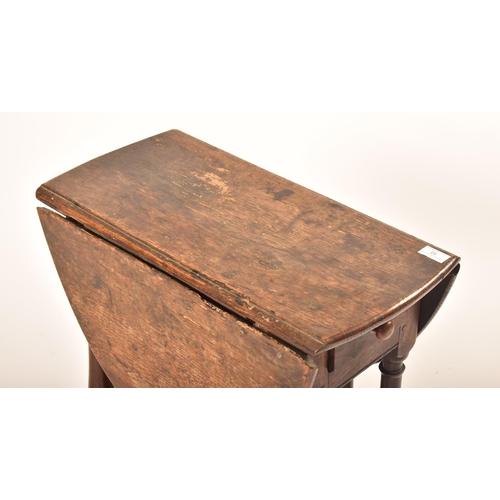 10 - A 17th century George III country oak small proportion drop leaf side table. Raised on turned legs w... 