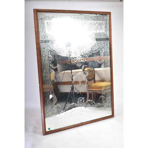 105 - A large pair of 20th century Edwardian shop / restaurant etched mirrors. Each mirror of rectangular ... 