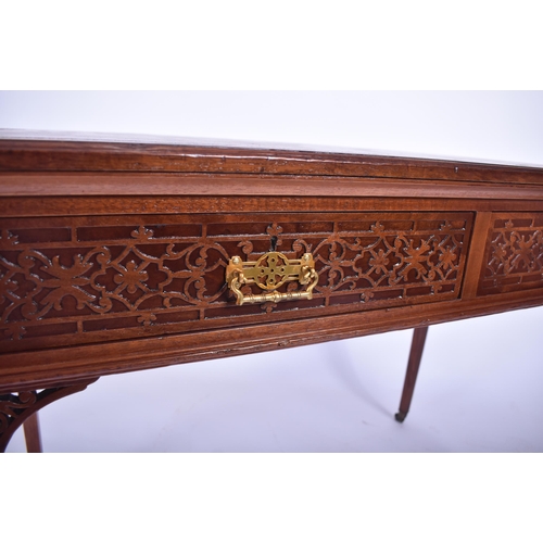 107 - A late 19th century Victorian mahogany Chinese Chippendale influenced writing table desk. The desk h... 