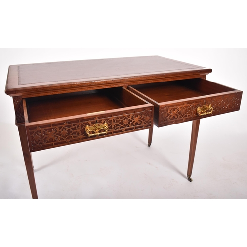 107 - A late 19th century Victorian mahogany Chinese Chippendale influenced writing table desk. The desk h... 