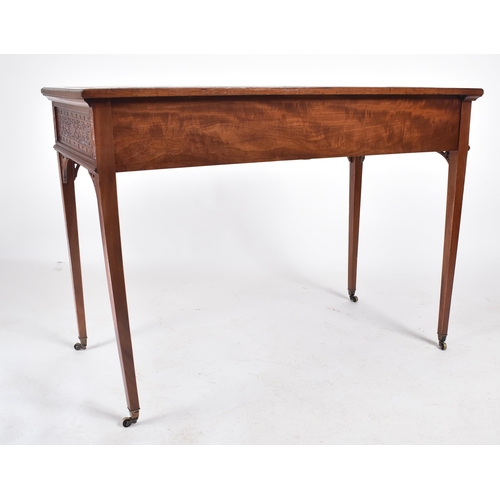 107 - A late 19th century Victorian mahogany Chinese Chippendale influenced writing table desk. The desk h... 