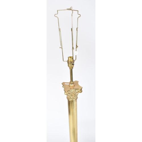 113 - A pair of 20th century gilt metal neoclassical inspired floor standard lamps lights. Each lamp in th... 