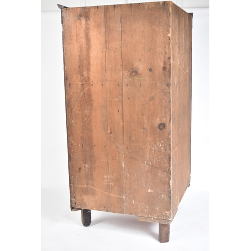 115 - A 17th century carved oak large corner cabinet. Raised on block feet with banded plinth to base. Abo... 