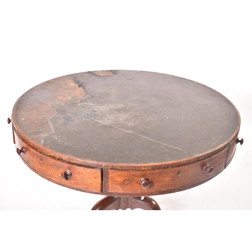 117 - A George III 19th century mahogany circular rent table. The table having a black leather skiver inse... 