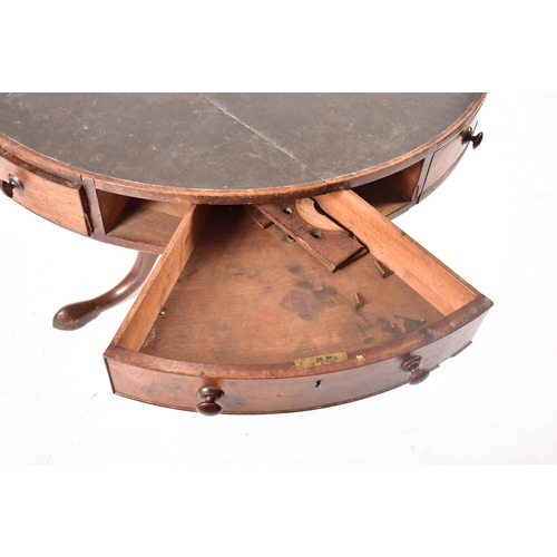 117 - A George III 19th century mahogany circular rent table. The table having a black leather skiver inse... 