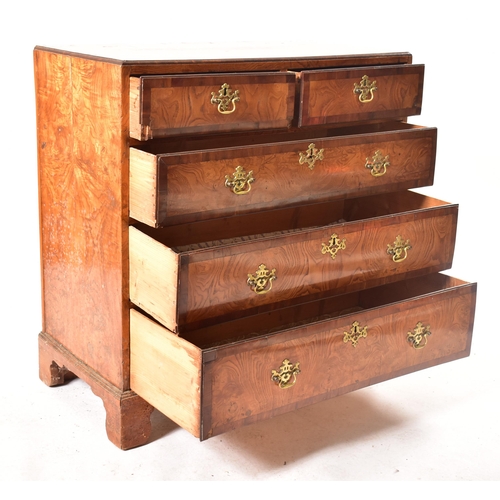 12 - An 18th century Queen Anne pollard oak crossbanded chest of drawers. Raised on bracket feet with sho... 