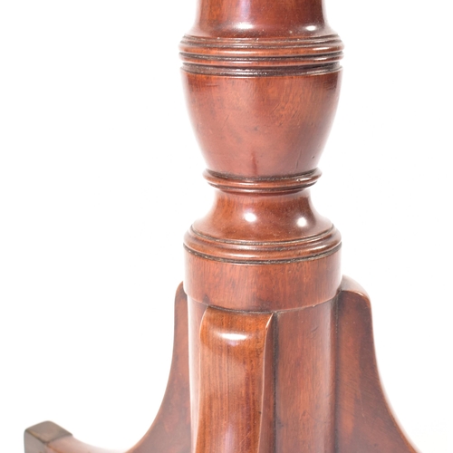 121 - A late 18th century George III solid mahogany tilt top pedestal table. Raised on  splayed legs with ... 