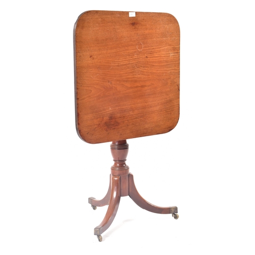 121 - A late 18th century George III solid mahogany tilt top pedestal table. Raised on  splayed legs with ... 