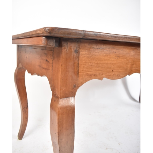 125 - A late 19th century French continental fruitwood refectory farmhouse dining table. The table having ... 