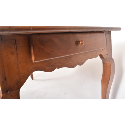 125 - A late 19th century French continental fruitwood refectory farmhouse dining table. The table having ... 