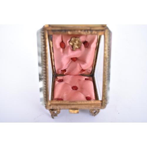 126 - A Victorian 19th century gilt metal & bevelled glass pocket watch casket case on feet. The casket wi... 