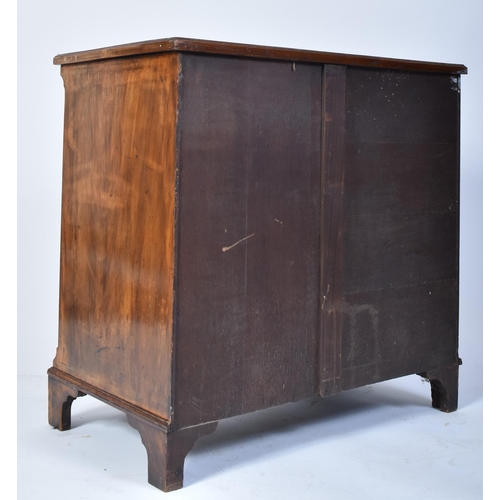 135 - A late 18th century Queen Anne revival walnut kneehole desk. Raised on bracket feet with drawers to ... 