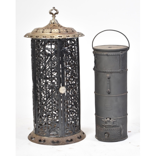 140 - A 19th century French continental black enamel cast iron conservatory / orangery wood burner. The wo... 