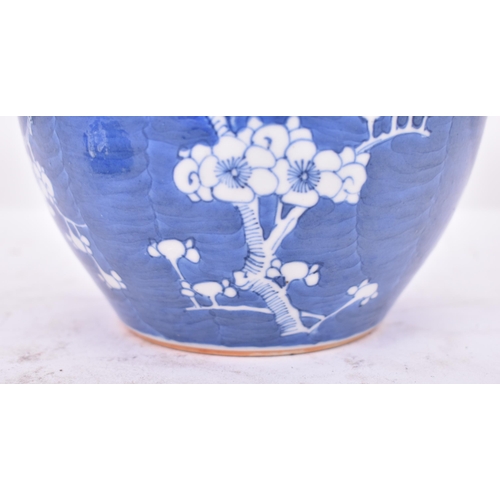 144 - A late 19th century Chinese Oriental blue & white porcelain Prunus patter ginger jar. The jar painte... 