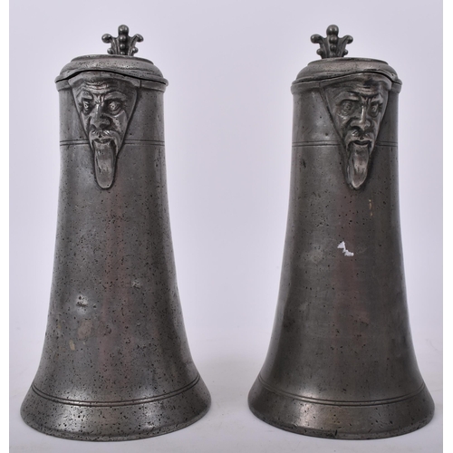 15 - A pair of early 18th century circa 1730 Swiss continental pewter Bartmannstize ' Bearded Man Flagon ... 