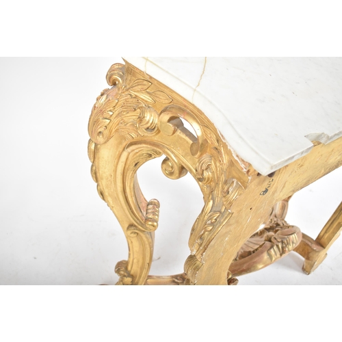 150 - A 19th century Rococo style gilt wood & marble top console hall table. The table having a serpentine... 