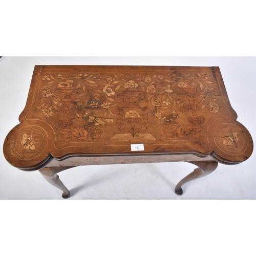 152 - An 18th century Dutch walnut & marquetry inlaid dog ear games / card table. Raised on cabriole legs ... 