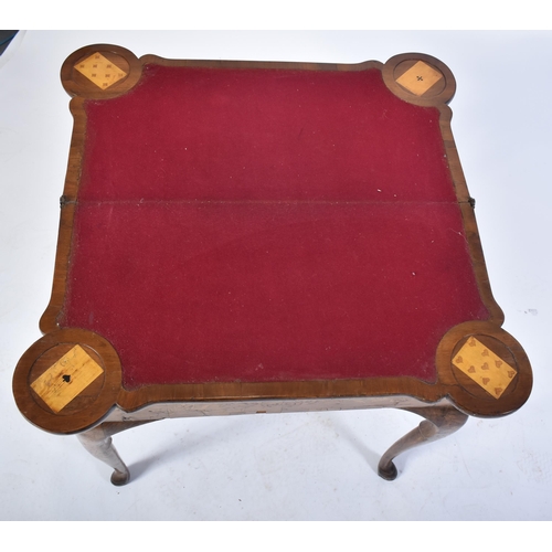 152 - An 18th century Dutch walnut & marquetry inlaid dog ear games / card table. Raised on cabriole legs ... 