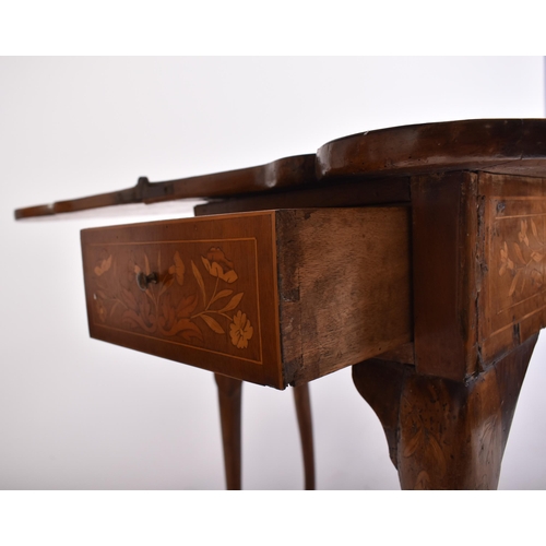 152 - An 18th century Dutch walnut & marquetry inlaid dog ear games / card table. Raised on cabriole legs ... 