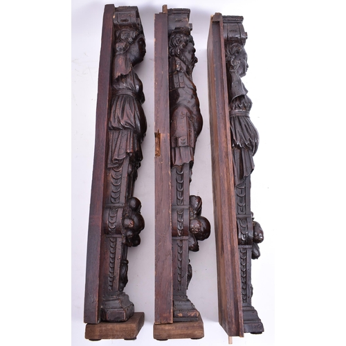 153 - A set of three 16th century French hand carved walnut termes. Each of upright form with carved scrol... 