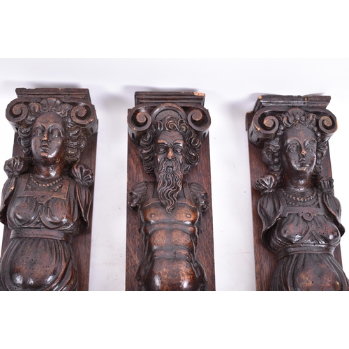 153 - A set of three 16th century French hand carved walnut termes. Each of upright form with carved scrol... 