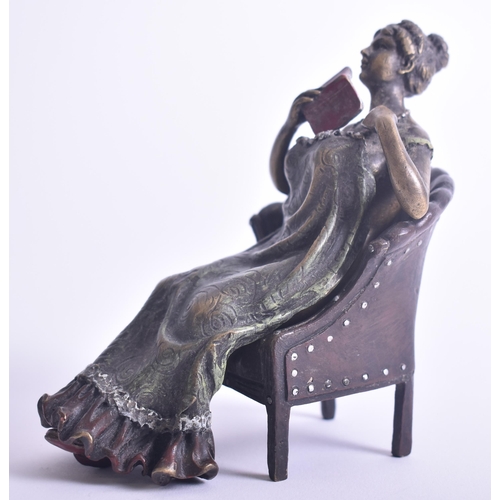 155 - Franz Bergman - an early 20th century Austrian cold painted bronze of a nude woman reading beneath a... 