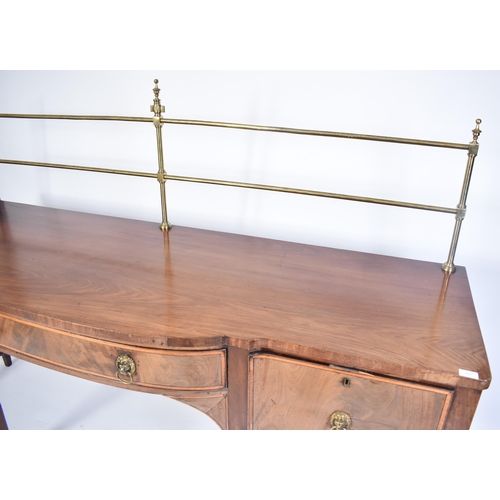 157 - A late 18th century George III Sheraton manner sideboard credenza. Raised on square tapering legs wi... 