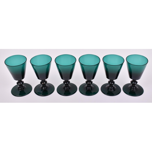 161 - A set of six late George III 19th century circa 1810s green glass tapering wine glasses. Each glass ... 