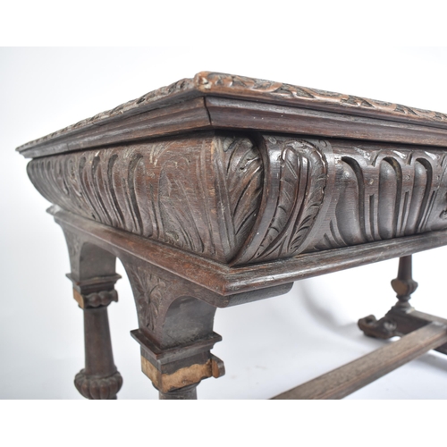 162 - A 19th century Victorian carved oak writing table desk. The oak top with gadrooned borders set over ... 