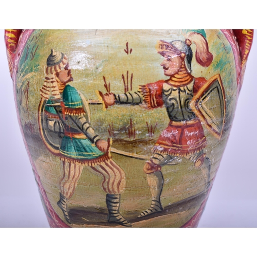 164 - An early 20th century Italian Sicilian painted terracotta twin handled amphora vase. The vase having... 