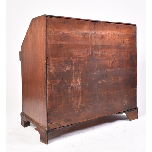 17 - A 19th century George III Cuban mahogany bureau desk. Raised on bracket feet with a series of drawer... 