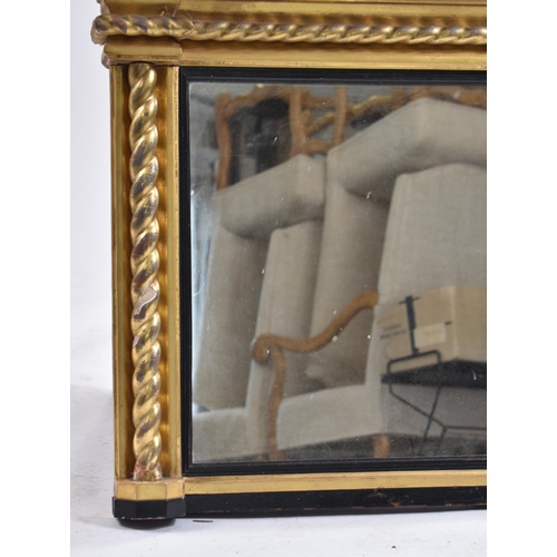 178 - A 19th century giltwood and gesso framed overmantel mirror. The mirror having flyaway cornice over b... 