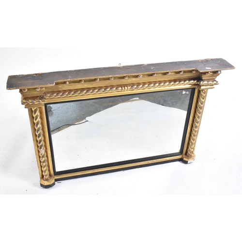 178 - A 19th century giltwood and gesso framed overmantel mirror. The mirror having flyaway cornice over b... 