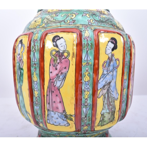 179 - A large 19th century Chinese famille rose green vase. The vase having a flared rim with elongated ne... 