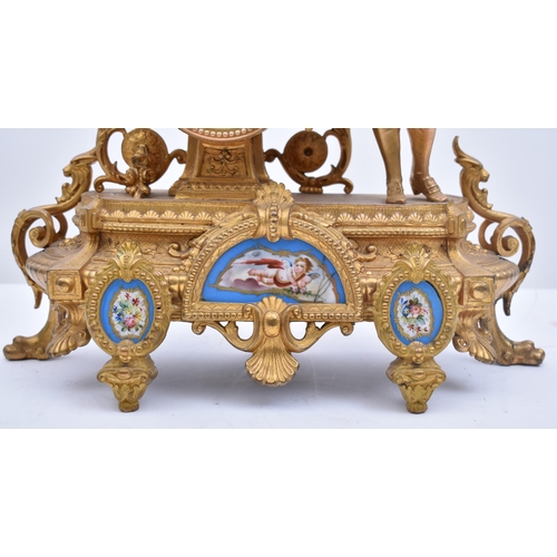 181 - A 19th century French gilt and enamel worked mantel clock. The cylinder head clock inset with Sevres... 