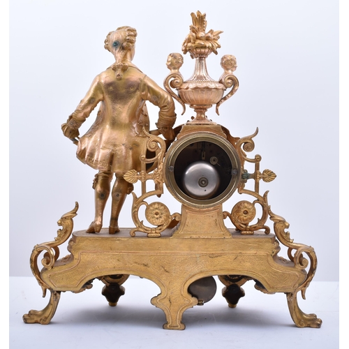 181 - A 19th century French gilt and enamel worked mantel clock. The cylinder head clock inset with Sevres... 