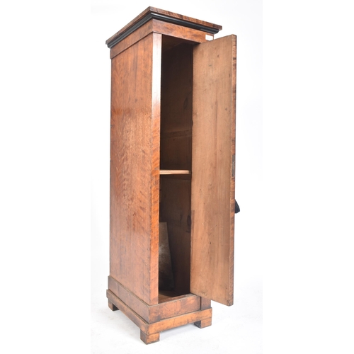 192 - An early Victorian early 19th century mahogany tall bust plant hall / bedroom cupboard stand. The cu... 