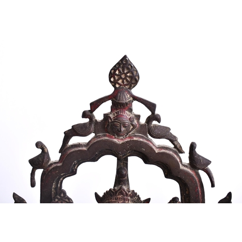 195 - A 19th century bronze altar temple sculpture depicting an Indian dancing deity. The god figure four ... 