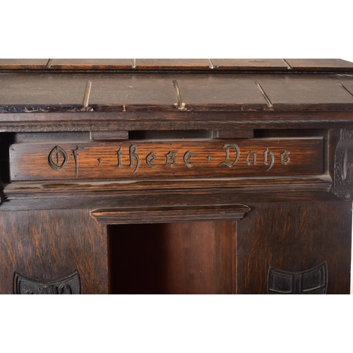 200 - An early 20th century circa 1902 American 'Tabard Inn Library' ebonised oak revolving bookcase. The ... 