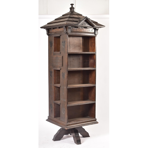 200 - An early 20th century circa 1902 American 'Tabard Inn Library' ebonised oak revolving bookcase. The ... 