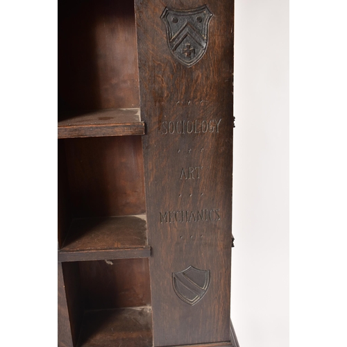 200 - An early 20th century circa 1902 American 'Tabard Inn Library' ebonised oak revolving bookcase. The ... 